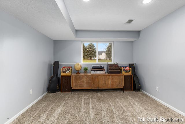 69 Rogue River View Drive NE, Rockford, MI 49341