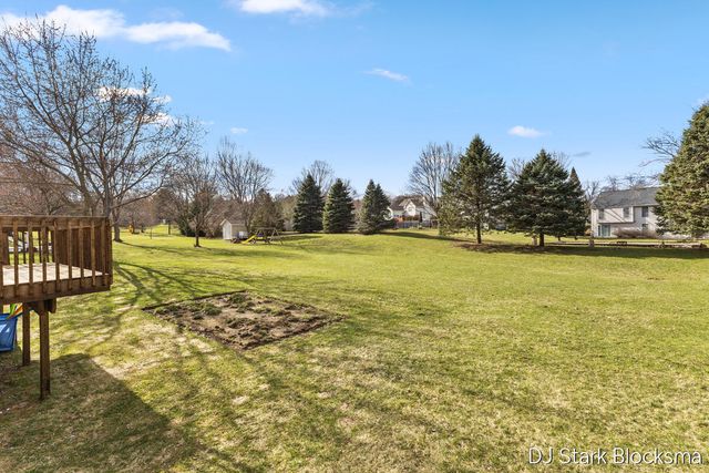 69 Rogue River View Drive NE, Rockford, MI 49341