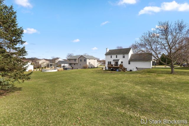 69 Rogue River View Drive NE, Rockford, MI 49341