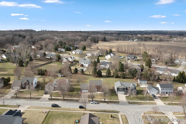 69 Rogue River View Drive NE, Rockford, MI 49341