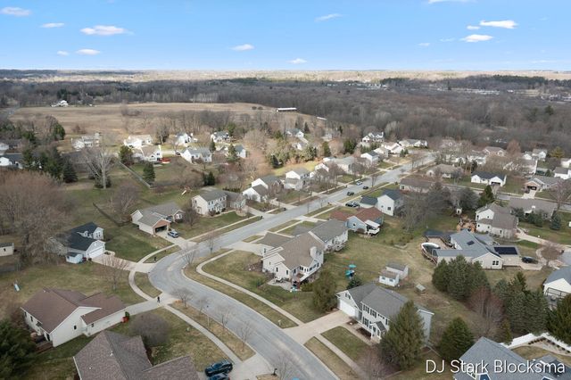 69 Rogue River View Drive NE, Rockford, MI 49341