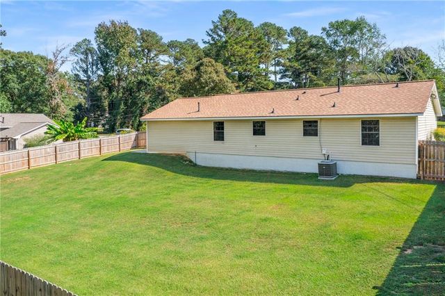 1141 Holly Hills SW Drive, Lilburn, GA 30047