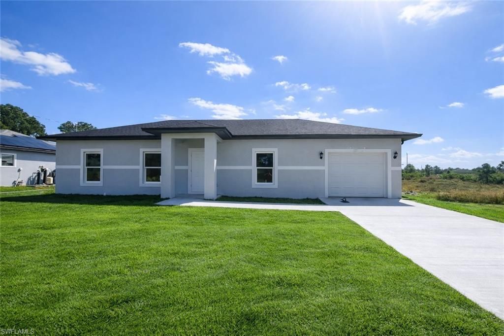 538 Cypress AVE S, Lehigh Acres, FL 33974