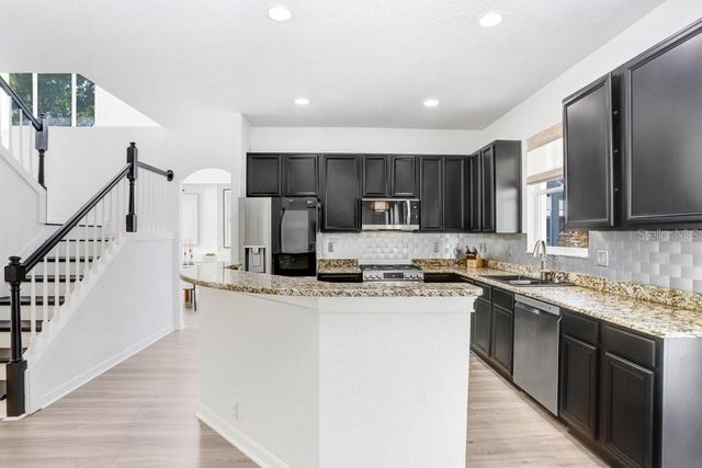 18124 COURTNEY BREEZE DRIVE, Tampa, FL 33647