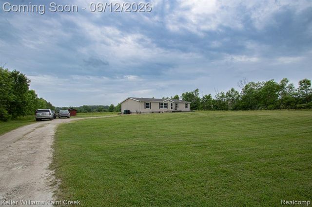 9795 Lambs Road, Wales, MI 48027
