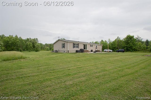 9795 Lambs Road, Wales, MI 48027