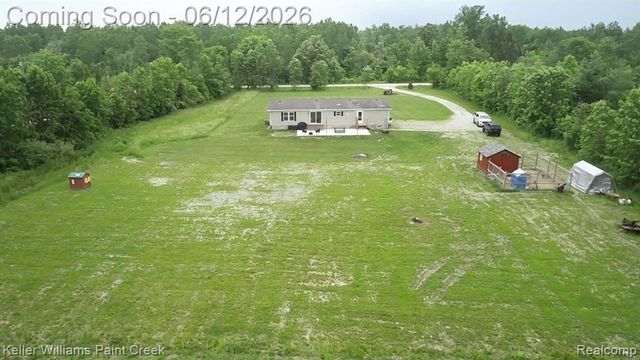 9795 Lambs Road, Wales, MI 48027