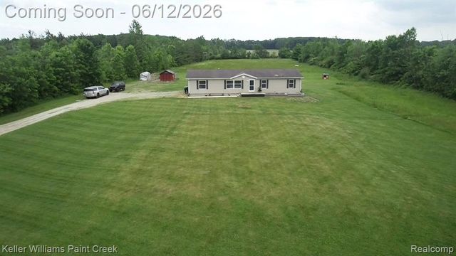 9795 Lambs Road, Wales, MI 48027