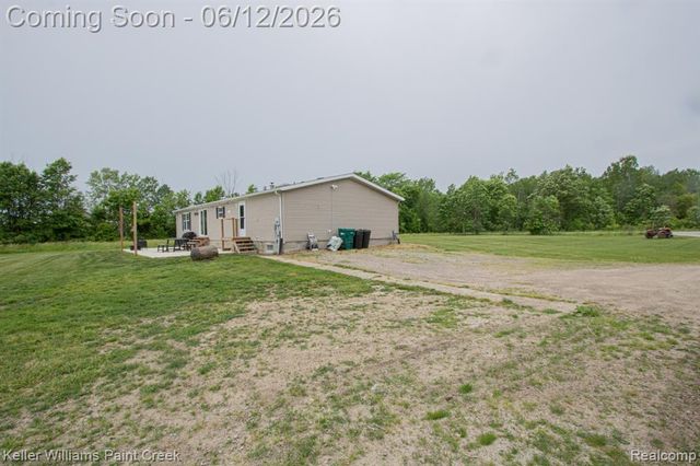 9795 Lambs Road, Wales, MI 48027