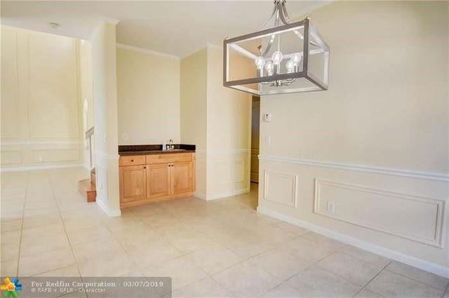 5874 NW 49th Ln, Coconut Creek, FL 33073