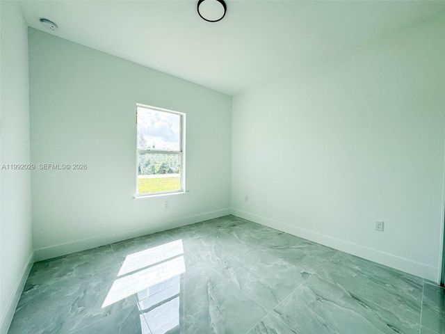 852 Belden Ave, Lehigh Acres, FL 33974