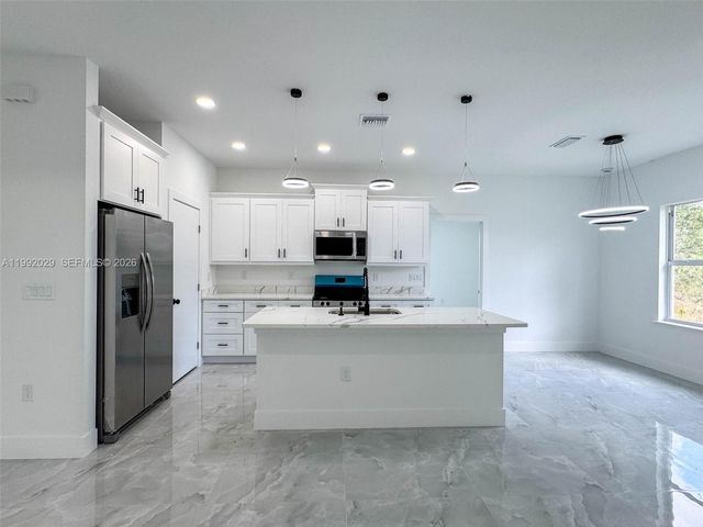 852 Belden Ave, Lehigh Acres, FL 33974