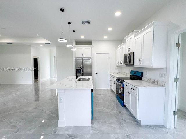 852 Belden Ave, Lehigh Acres, FL 33974