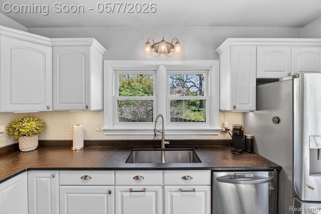 123 Riddle Street, Howell, MI 48843