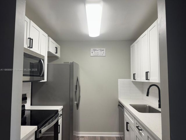 13450 SW 3rd St 409D, Pembroke Pines, FL 33027