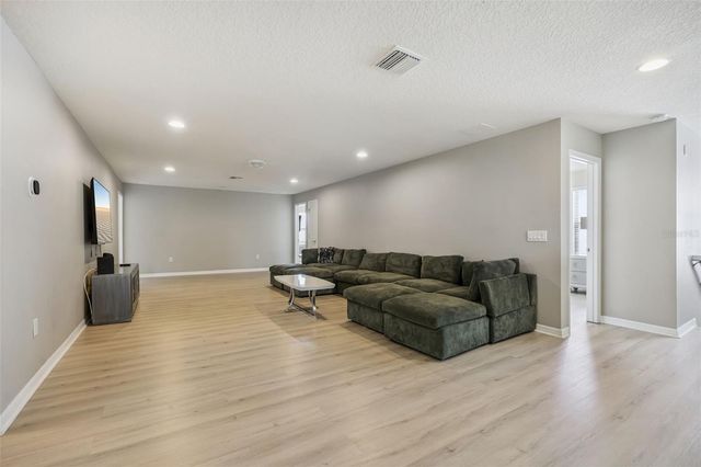 8875 QIN LOOP, Kissimmee, FL 34747