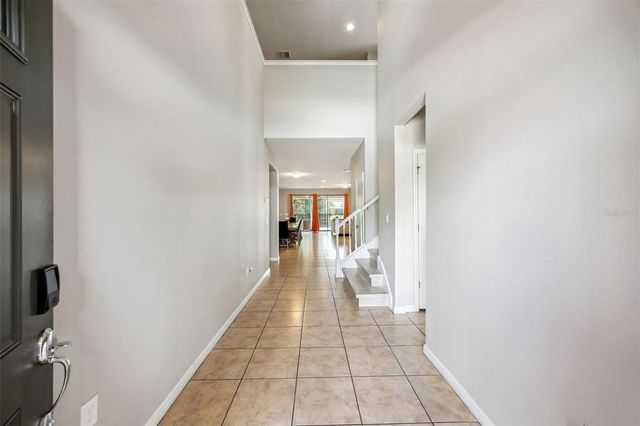 8875 QIN LOOP, Kissimmee, FL 34747