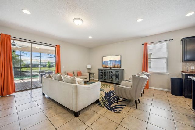 8875 QIN LOOP, Kissimmee, FL 34747