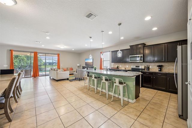 8875 QIN LOOP, Kissimmee, FL 34747