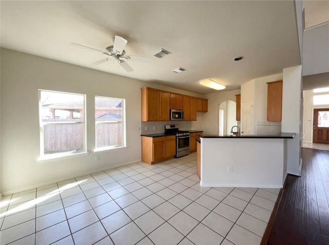 200 Rippling Creek Lane, Alvin, TX 77511