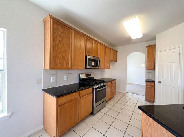 200 Rippling Creek Lane, Alvin, TX 77511