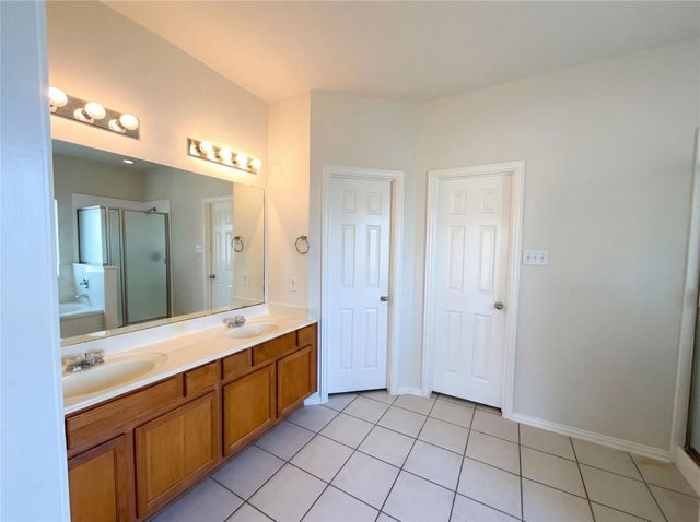 200 Rippling Creek Lane, Alvin, TX 77511