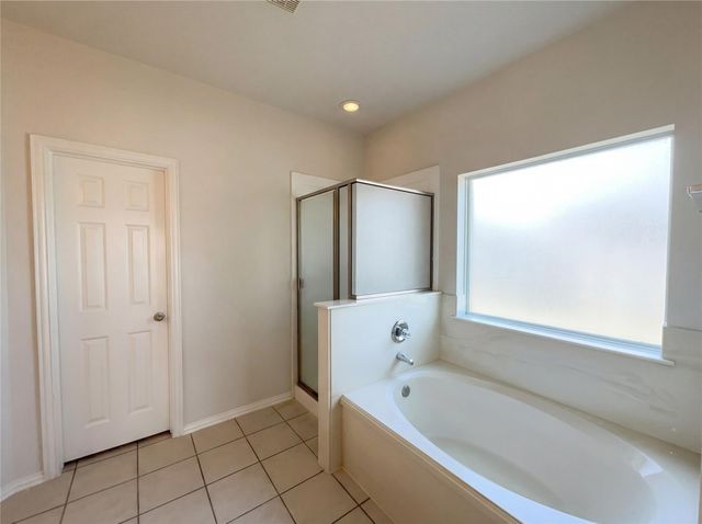 200 Rippling Creek Lane, Alvin, TX 77511