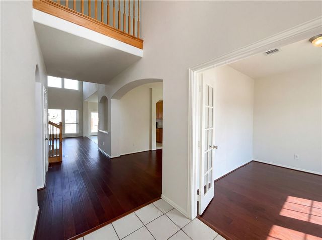 200 Rippling Creek Lane, Alvin, TX 77511