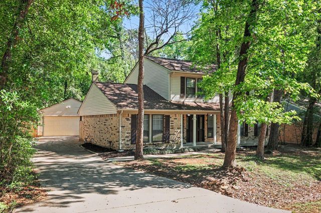 34 E Wandering Oak Drive, The Woodlands, TX 77381