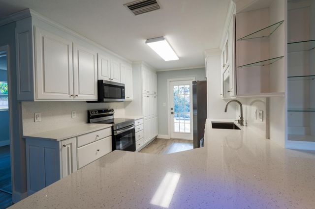 1891 Meadow Court, Palm Springs, FL 33406