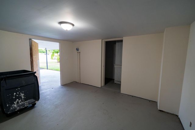 1891 Meadow Court, Palm Springs, FL 33406
