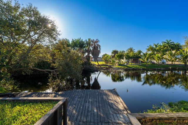 1891 Meadow Court, Palm Springs, FL 33406