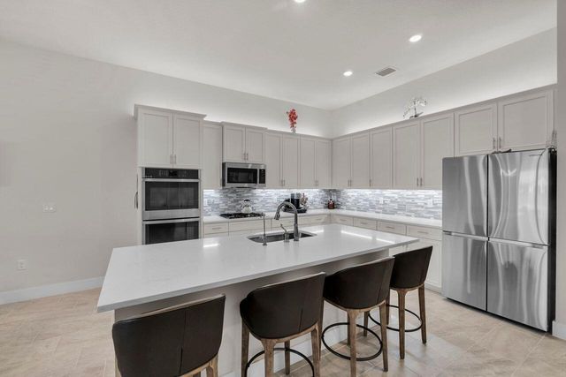 7721 S Blue Spring Drive, Parkland, FL 33067