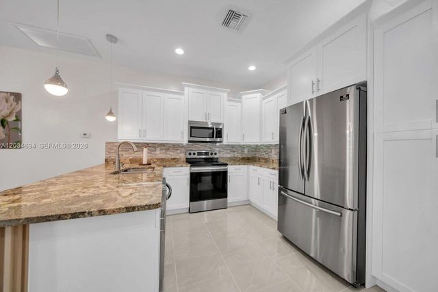 60 Floyd Ave S, Lehigh Acres, FL 33976