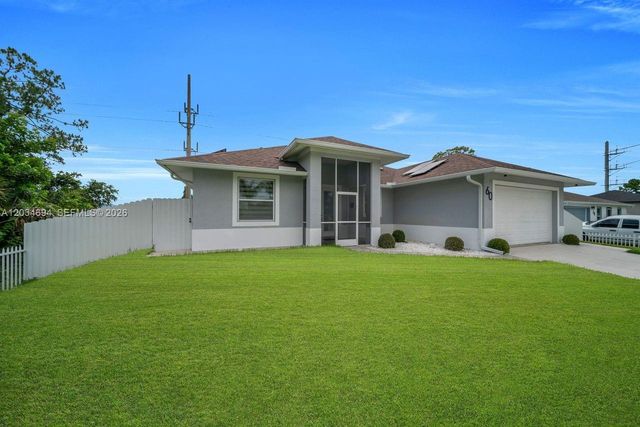 60 Floyd Ave S, Lehigh Acres, FL 33976