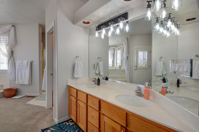 3058 Ashkirk Loop SE, Rio Rancho, NM 87124