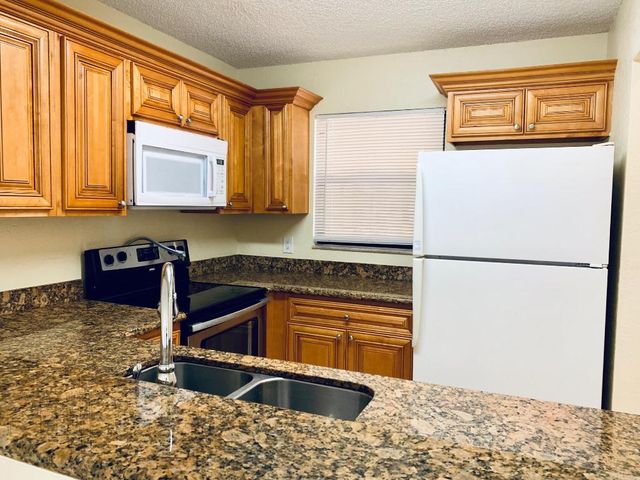 1566 Lake Crystal Drive A, West Palm Beach, FL 33411