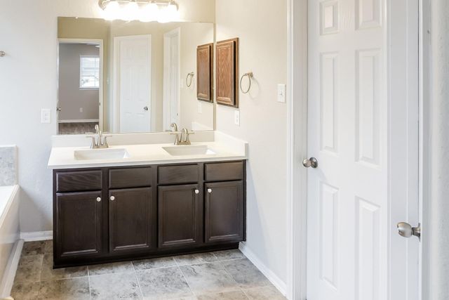 19011 Woodland Leaf Lane, Tomball, TX 77375