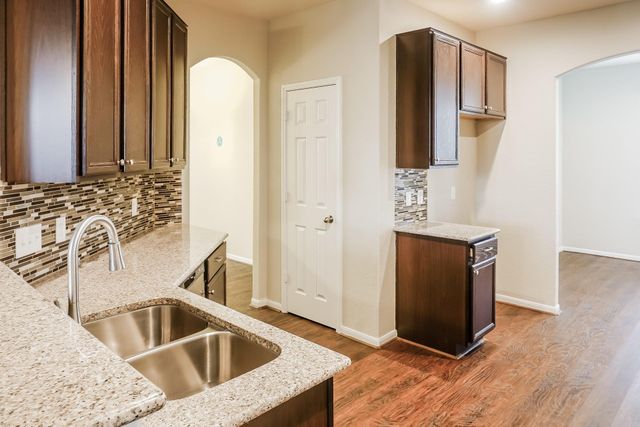19011 Woodland Leaf Lane, Tomball, TX 77375