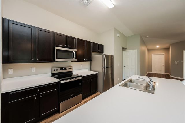4458 WINDSONG AVENUE, North Port, FL 34287