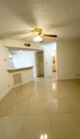 9055 Wiles Rd 103, Coral Springs, FL 33067