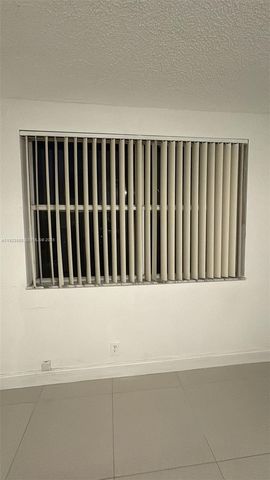 9055 Wiles Rd 103, Coral Springs, FL 33067