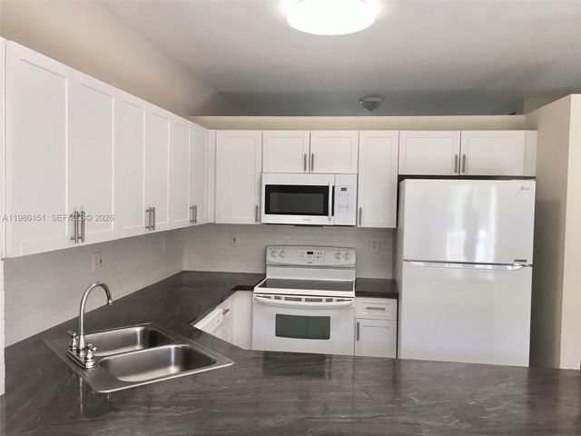 6930 NW 179th St 307-8, Hialeah, FL 33015