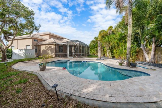 4963 NW 58th Ave, Coral Springs, FL 33067