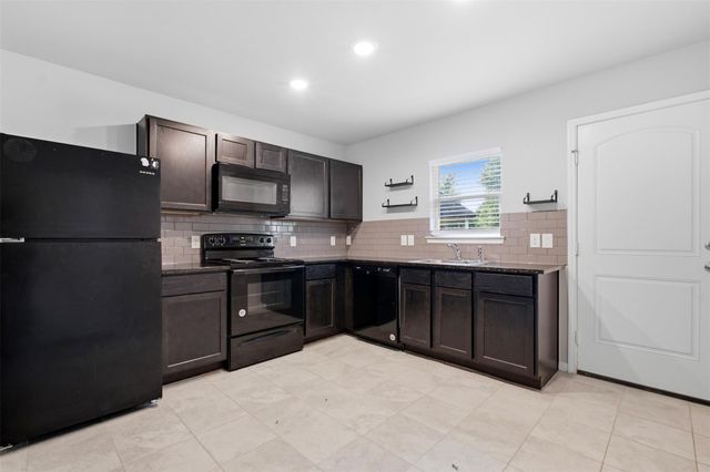 15081 Travis Lane, Willis, TX 77378