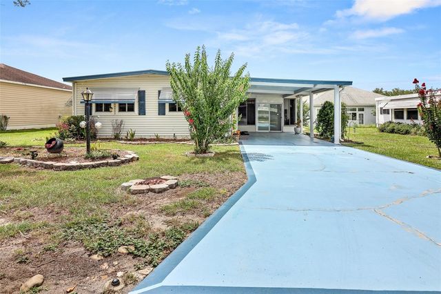 919 WEEPING WILLOW AVENUE, Lady Lake, FL 32159