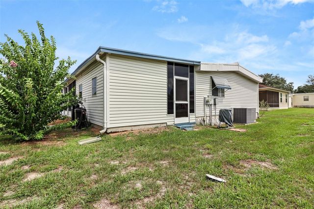 919 WEEPING WILLOW AVENUE, Lady Lake, FL 32159