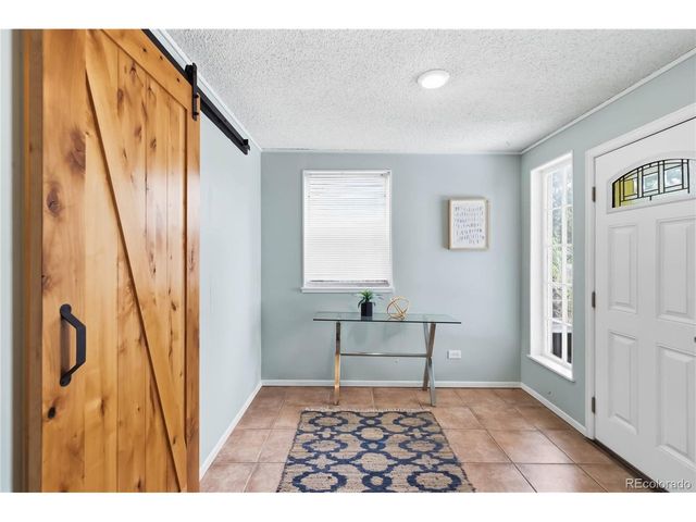 1225 Roslyn St, Denver, CO 80220