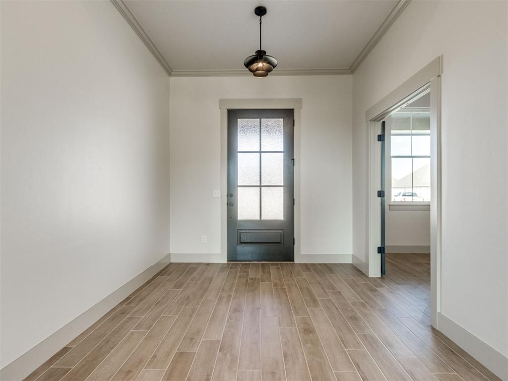 Image 6 of property listing at 1120 Jozie Way, Tuttle, OK 73089