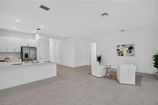 12448 Violet LN, Naples, FL 34120